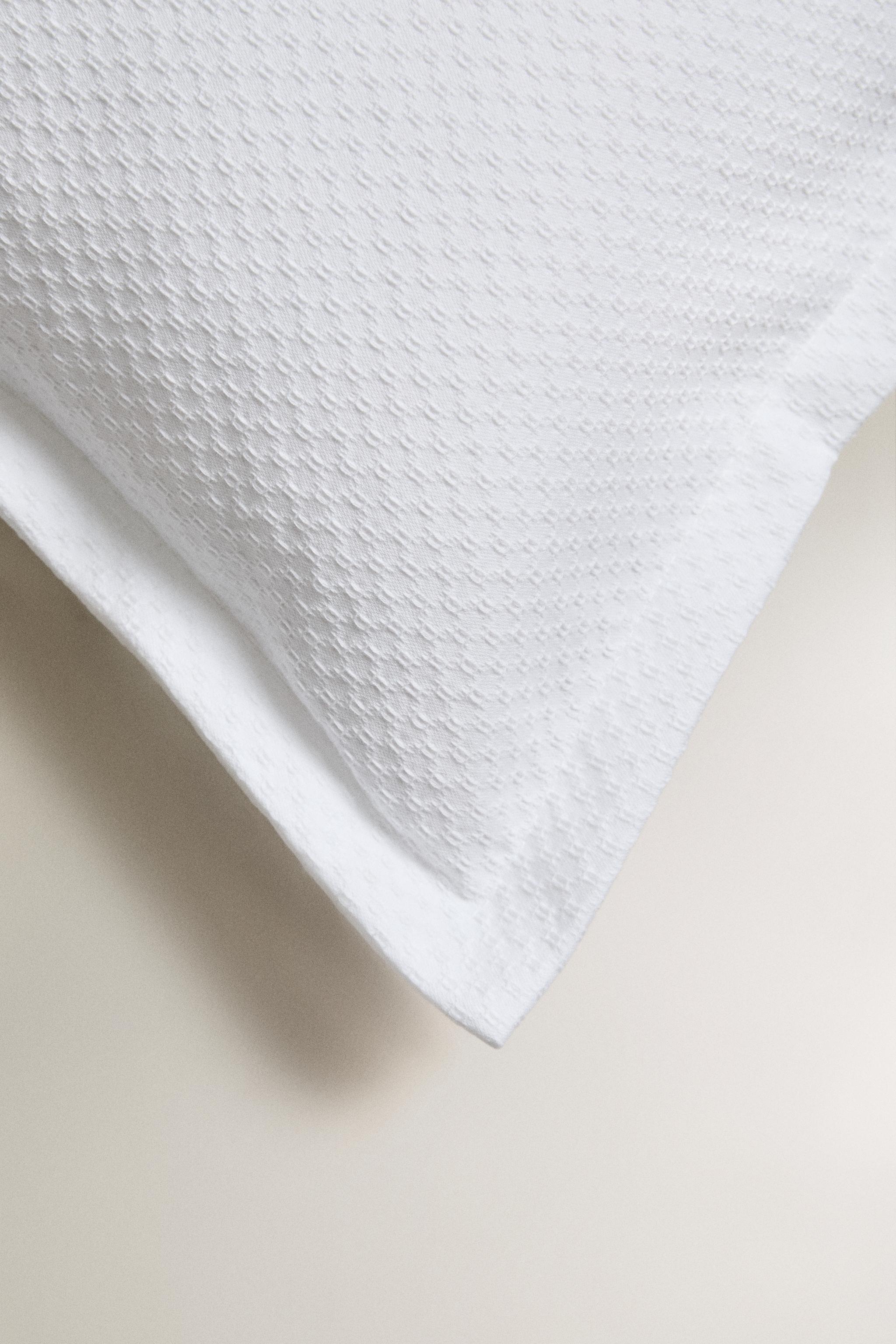 EMBOSSED THROW PILLOW COVER